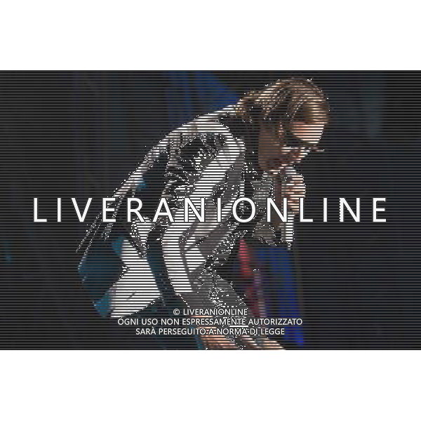 Canadian band Arcade Fire performing at Glastonbury Festival 2014, Worthy Farm, Pilton, Somerset, UK on Friday 27th June 2014. The Pyramid and Other Stages were closed and power shut whilst a lightning storm struck the festival. AG ALDO LIVERANI SAS ONLY ITALY