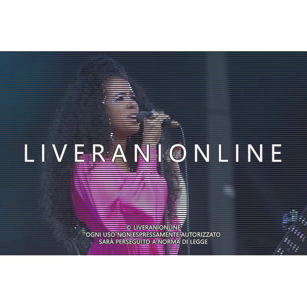 American singer-songwriter Kelis (born Kelis Rogers) performing on The Pyramid Stage at Glastonbury Festival 2014, Worthy Farm, Pilton, Somerset, UK on Saturday 28th June 2014. ©PHOTOSHOT/Agenzia Aldo Liverani sas - ITALY ONLY - EDITORIAL USE ONLY