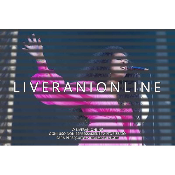 American singer-songwriter Kelis (born Kelis Rogers) performing on The Pyramid Stage at Glastonbury Festival 2014, Worthy Farm, Pilton, Somerset, UK on Saturday 28th June 2014. ©PHOTOSHOT/Agenzia Aldo Liverani sas - ITALY ONLY - EDITORIAL USE ONLY