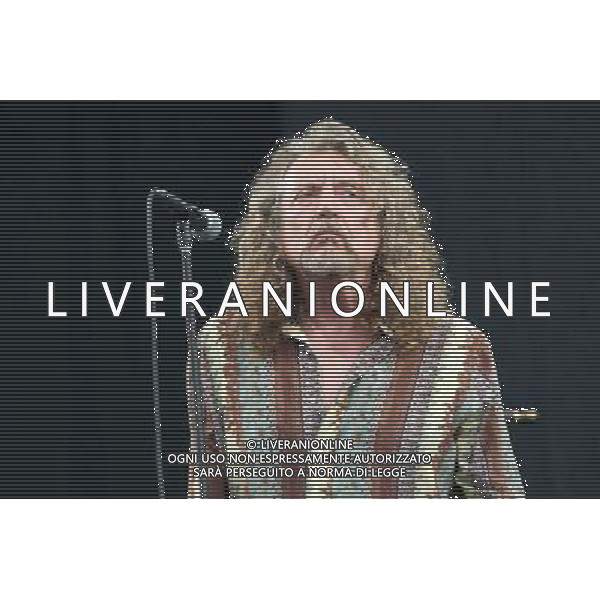 English singer-songwriterand Led Zeppelin vocalist Robert Plant (CBE) performs on The Pyramid Stage at Glastonbury Festival 2014, Worthy Farm, Pilton, Somerset, UK on Saturday 28th June 2014. ©PHOTOSHOT/Agenzia Aldo Liverani sas - ITALY ONLY - EDITORIAL USE ONLY
