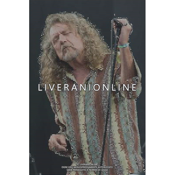 English singer-songwriterand Led Zeppelin vocalist Robert Plant (CBE) performs on The Pyramid Stage at Glastonbury Festival 2014, Worthy Farm, Pilton, Somerset, UK on Saturday 28th June 2014. ©PHOTOSHOT/Agenzia Aldo Liverani sas - ITALY ONLY - EDITORIAL USE ONLY