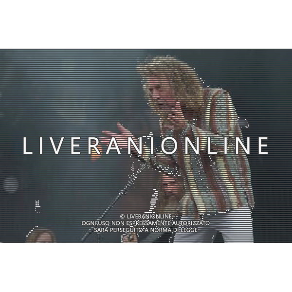 English singer-songwriterand Led Zeppelin vocalist Robert Plant (CBE) performs on The Pyramid Stage at Glastonbury Festival 2014, Worthy Farm, Pilton, Somerset, UK on Saturday 28th June 2014. ©PHOTOSHOT/Agenzia Aldo Liverani sas - ITALY ONLY - EDITORIAL USE ONLY