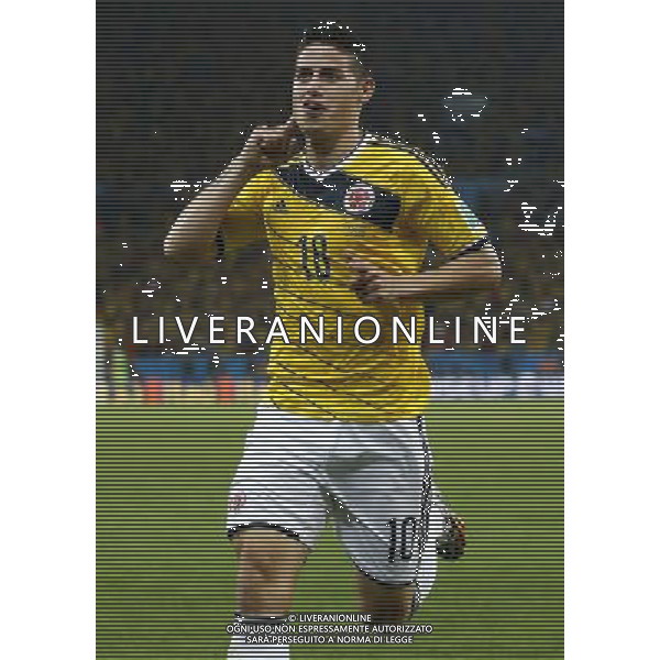 (140628) -- RIO DE JANEIRO, June 28, 2014 () -- Colombia\'s James Rodriguez celebrates his first goal during a Round of 16 match between Colombia and Uruguay of 2014 FIFA World Cup at the Estadio do Maracana Stadium in Rio de Janeiro, Brazil, on June 28, 2014. Colombia won 2-0 over Uruguay and qualified for Quarter-finals on Saturday.(/Wang Lili)(pcy) ©PHOTOSHOT/Agenzia Aldo Liverani sas - ITALY ONLY - EDITORIAL USE ONLY - Uruguay vs Colombia Coppa del Mondo FIFA 2014 Estadio do Stadio Maracana\' di Rio de Janeiro, in Brasile, il 28 giugno 2014. La Colombia ha vinto per 2-0 contro l\'Uruguay e si qualifica per Quarti di finale