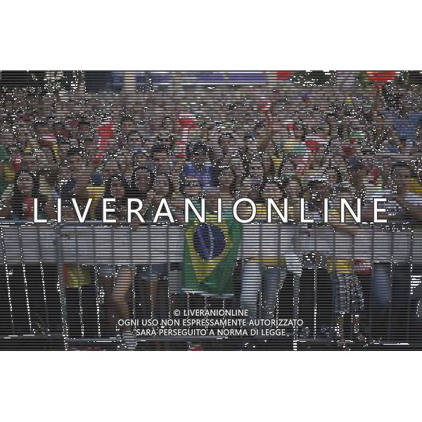 (140628) -- BELO HORIZONTE, June 28, 2014 () -- Supporters of Brazil react while watching a Round of 16 match between Brazil and Chile of 2014 FIFA World Cup at the Savassi Plaza in Belo Horizonte, Brazil, on June 28, 2014. Brazil won 4-3 (3-2 in penalties) over Chile and qualified for Quarter-finals on Saturday. (/Mauricio Valenzuela)(pcy) ©PHOTOSHOT/Agenzia Aldo Liverani sas - ITALY ONLY - EDITORIAL USE ONLY - Brasile Vs Cile Coppa del Mondo di calcio Fifa 2014 28 giugno 2014. Brasile ha vinto 4-3 (3-2 ai calci di rigore) e si qualifica per Quarti di finale