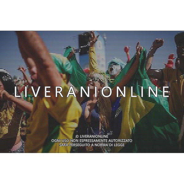 (140628) -- BRASILIA, June 28, 2014 () -- Brazil\'s fans react while watching the broadcast of a Round of 16 match between Brazil and Chile at the FIFA Fan Fest in Brasilia, Brazil, on June 28, 2014. Brazil won 4-3 (3-2 in penalties) over Chile and qualified for Quarter-finals on Saturday. (/Jhon Paz) ©PHOTOSHOT/Agenzia Aldo Liverani sas - ITALY ONLY - EDITORIAL USE ONLY - Brasile Vs Cile Coppa del Mondo di calcio Fifa 2014 28 giugno 2014. Brasile ha vinto 4-3 (3-2 ai calci di rigore) e si qualifica per Quarti di finale