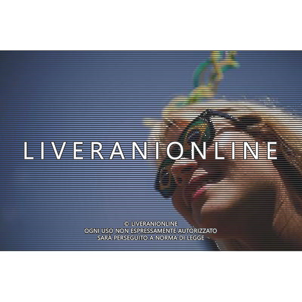 (140628) -- BRASILIA, June 28, 2014 () -- A Brazil\'s fan reacts while watching the broadcast of a Round of 16 match between Brazil and Chile at the FIFA Fan Fest in Brasilia, Brazil, on June 28, 2014. Brazil won 4-3 (3-2 in penalties) over Chile and qualified for Quarter-finals on Saturday. (/Jhon Paz) ©PHOTOSHOT/Agenzia Aldo Liverani sas - ITALY ONLY - EDITORIAL USE ONLY - Brasile Vs Cile Coppa del Mondo di calcio Fifa 2014 28 giugno 2014. Brasile ha vinto 4-3 (3-2 ai calci di rigore) e si qualifica per Quarti di finale