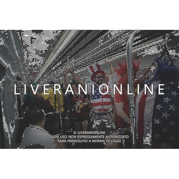 (140626) -- RECIFE, June 26, 2014 (Xinhua) -- Supporters of the U.S. are seen on a train to the Arena Pernambuco Stadium where a Group G match between the U.S. and Germany of 2014 FIFA World Cup is held, in Recife, Brazil, June 26, 2014. Germany won 1-0 over the U.S. on Thursday. Germany and the U.S. enter Round of 16 from Group G. (Xinhua/Mauricio Valenzuela)(pcy) ©PHOTOSHOT/Agenzia Aldo Liverani sas - ITALY ONLY - EDITORIAL USE ONLY - Stati Uniti vs Germania partita del Gruppo G Coppa del mondo FIFA 2014 26 giugno 2014. Germania ha vinto 1-0