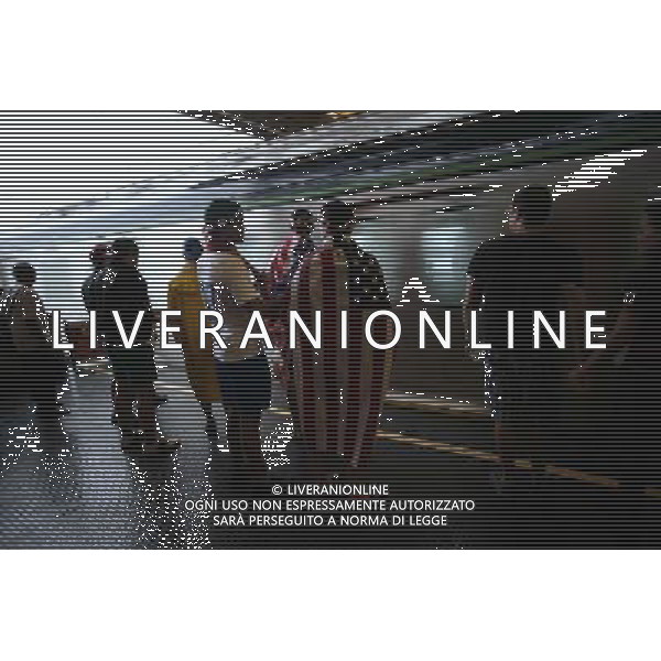 (140626) -- RECIFE, June 26, 2014 (Xinhua) -- Supporters of the U.S. wait for a train to the Arena Pernambuco Stadium where a Group G match between the U.S. and Germany of 2014 FIFA World Cup is held, in Recife, Brazil, June 26, 2014. Germany won 1-0 over the U.S. on Thursday. Germany and the U.S. enter Round of 16 from Group G. (Xinhua/Mauricio Valenzuela)(pcy) ©PHOTOSHOT/Agenzia Aldo Liverani sas - ITALY ONLY - EDITORIAL USE ONLY - Stati Uniti vs Germania partita del Gruppo G Coppa del mondo FIFA 2014 26 giugno 2014. Germania ha vinto 1-0