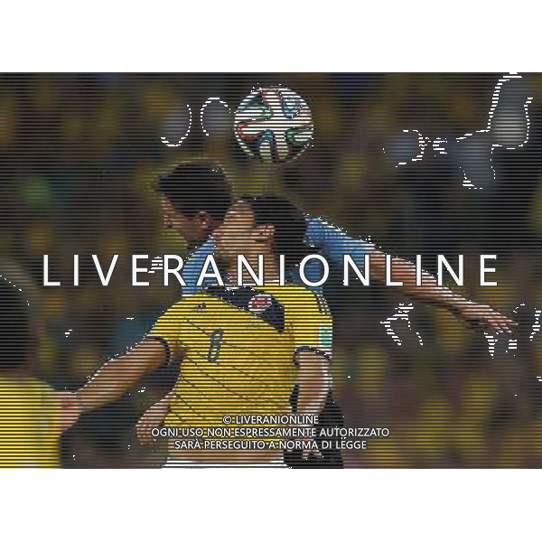 (140628) -- RIO DE JANEIRO, June 28, 2014 () -- Colombia\'s Abel Aguilar jumps for a header during a Round of 16 match between Colombia and Uruguay of 2014 FIFA World Cup at the Estadio do Maracana Stadium in Rio de Janeiro, Brazil, on June 28, 2014.(/Xu Zijian)(rh) ©PHOTOSHOT/Agenzia Aldo Liverani sas - ITALY ONLY - EDITORIAL USE ONLY - Uruguay vs Colombia Coppa del Mondo FIFA 2014 Estadio do Stadio Maracana\' di Rio de Janeiro, in Brasile, il 28 giugno 2014. La Colombia ha vinto per 2-0 contro l\'Uruguay e si qualifica per Quarti di finale