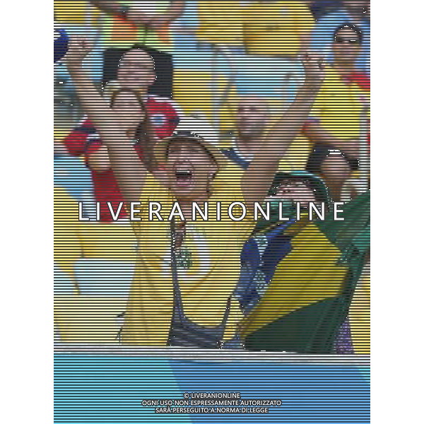 (140628) -- RIO DE JANEIRO, June 28, 2014 () -- A fan cheers during a Round of 16 match between Colombia and Uruguay of 2014 FIFA World Cup at the Estadio do Maracana Stadium in Rio de Janeiro, Brazil, on June 28, 2014.(/Xu Zijian)(rh) ©PHOTOSHOT/Agenzia Aldo Liverani sas - ITALY ONLY - EDITORIAL USE ONLY - Uruguay vs Colombia Coppa del Mondo FIFA 2014 Estadio do Stadio Maracana\' di Rio de Janeiro, in Brasile, il 28 giugno 2014. La Colombia ha vinto per 2-0 contro l\'Uruguay e si qualifica per Quarti di finale