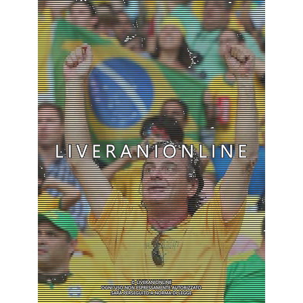 (140628) -- RIO DE JANEIRO, June 28, 2014 () -- A fan cheers during a Round of 16 match between Colombia and Uruguay of 2014 FIFA World Cup at the Estadio do Maracana Stadium in Rio de Janeiro, Brazil, on June 28, 2014.(/Xu Zijian)(rh) ©PHOTOSHOT/Agenzia Aldo Liverani sas - ITALY ONLY - EDITORIAL USE ONLY - Uruguay vs Colombia Coppa del Mondo FIFA 2014 Estadio do Stadio Maracana\' di Rio de Janeiro, in Brasile, il 28 giugno 2014. La Colombia ha vinto per 2-0 contro l\'Uruguay e si qualifica per Quarti di finale