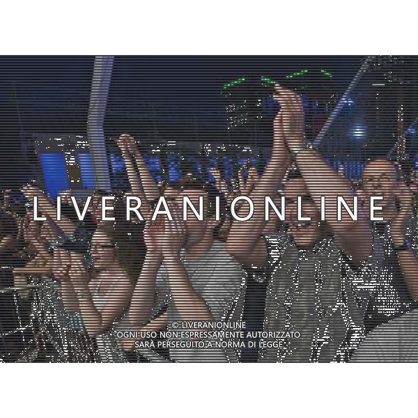 (140627) -- MONTREAL, June 27, 2014 () -- People admire French singer \'Woodkid\' Yoanne Lemoine\'s performance during the Montreal International Jazz Festival in Montreal, Canada, on June 26, 2014. The 35th edition of the Montreal International Jazz Festival opened this evening with a free outdoor concert at the Quartier des spectacles in the heart of Montreal by \'Woodkid\' Yoanne Lemoine from France. (/Andrew Soong) ©PHOTOSHOT/Agenzia Aldo Liverani sas - ITALY ONLY - EDITORIAL USE ONLY