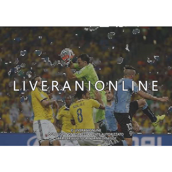 (140628) -- RIO DE JANEIRO, June 28, 2014 () -- Colombia\'s goalkeeper David Ospina (up) holds the ball during a Round of 16 match between Colombia and Uruguay of 2014 FIFA World Cup at the Estadio do Maracana Stadium in Rio de Janeiro, Brazil, on June 28, 2014. Colombia won 2-0 over Uruguay and qualified for Quarter-finals on Saturday.(/Wang Lili)(pcy) AG ALDO LIVERANI SAS ONLY ITALY