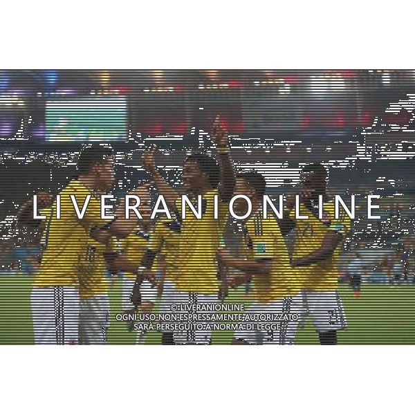(140628) -- RIO DE JANEIRO, June 28, 2014 () -- Colombia\'s players celebrate the goal during a Round of 16 match between Colombia and Uruguay of 2014 FIFA World Cup at the Estadio do Maracana Stadium in Rio de Janeiro, Brazil, on June 28, 2014.(/Xu Zijian)(rh) AG ALDO LIVERANI SAS ONLY ITALY