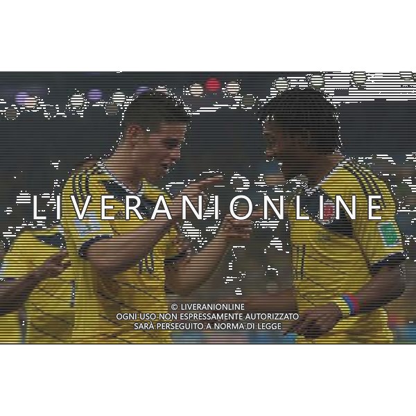 (140628) -- RIO DE JANEIRO, June 28, 2014 () -- Colombia\'s James Rodriguez (L) celebrates the goal during a Round of 16 match between Colombia and Uruguay of 2014 FIFA World Cup at the Estadio do Maracana Stadium in Rio de Janeiro, Brazil, on June 28, 2014.(/Xu Zijian)(rh) AG ALDO LIVERANI SAS ONLY ITALY