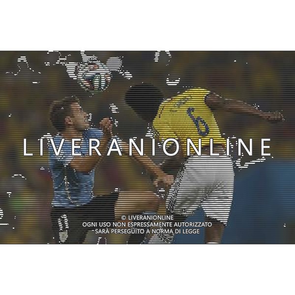 (140628) -- RIO DE JANEIRO, June 28, 2014 () -- Colombia\'s Carlos Sanchez (R) vies with Uruguay\'s Cristian Stuani during a Round of 16 match between Colombia and Uruguay of 2014 FIFA World Cup at the Estadio do Maracana Stadium in Rio de Janeiro, Brazil, on June 28, 2014. Colombia won 2-0 over Uruguay and qualified for Quarter-finals on Saturday.(/Wang Lili)(pcy) AG ALDO LIVERANI SAS ONLY ITALY