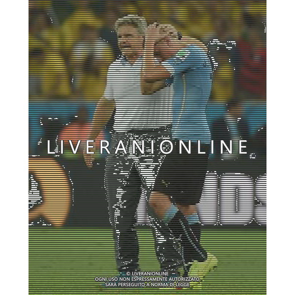 (140628) -- RIO DE JANEIRO, June 28, 2014 () -- Uruguay\'s Jose Maria Gimenez (R) reacts after a Round of 16 match between Colombia and Uruguay of 2014 FIFA World Cup at the Estadio do Maracana Stadium in Rio de Janeiro, Brazil, on June 28, 2014. Colombia won 2-0 over Uruguay on Saturday. (/Wang Yuguo)(rh) AG ALDO LIVERANI SAS ONLY ITALY