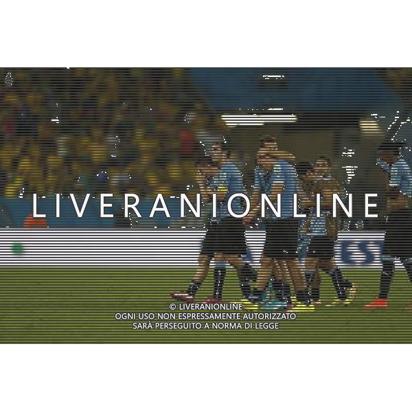 (140628) -- RIO DE JANEIRO, June 28, 2014 () -- Uruguay\'s players leave the field after a Round of 16 match between Colombia and Uruguay of 2014 FIFA World Cup at the Estadio do Maracana Stadium in Rio de Janeiro, Brazil, on June 28, 2014. Colombia won 2-0 over Uruguay and qualified for Quarter-finals on Saturday.(/Wang Lili)(pcy) AG ALDO LIVERANI SAS ONLY ITALY