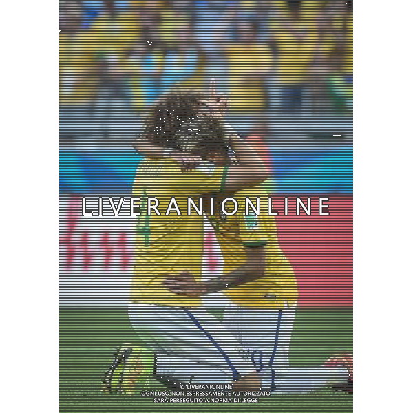 (140628) -- BELO HORIZONTE, June 28, 2014 () -- Brazil\'s Neymar (R) celebrates the victory with David Luiz after a Round of 16 match between Brazil and Chile of 2014 FIFA World Cup at the Estadio Mineirao Stadium in Belo Horizonte, Brazil, on June 28, 2014. Brazil won 4-3 (3-2 in penalties) over Chile and qualified for Quarter-finals on Saturday.(/Liu Dawei)(rh) AG ALDO LIVERANI SAS ONLY ITALY