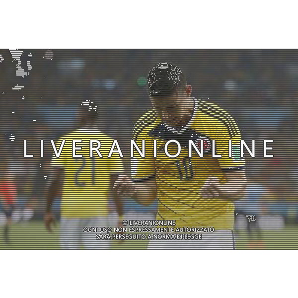(140628) -- RIO DE JANEIRO, June 28, 2014 () -- Colombia\'s James Rodriguez (R) celebrates a goal during a Round of 16 match between Colombia and Uruguay of 2014 FIFA World Cup at the Estadio do Maracana Stadium in Rio de Janeiro, Brazil, on June 28, 2014.(/Wang Lili)(pcy) AG ALDO LIVERANI SAS ONLY ITALY