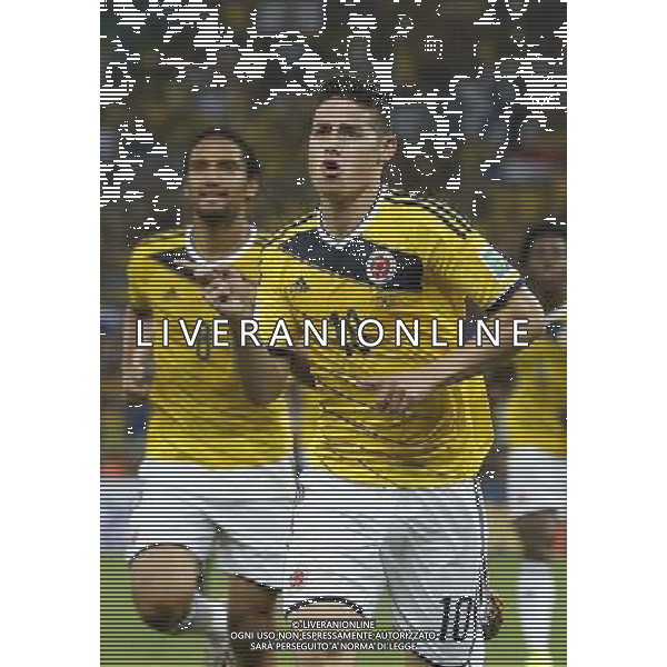 (140628) -- RIO DE JANEIRO, June 28, 2014 () -- Colombia\'s James Rodriguez (front) celebrates a goal during a Round of 16 match between Colombia and Uruguay of 2014 FIFA World Cup at the Estadio do Maracana Stadium in Rio de Janeiro, Brazil, on June 28, 2014.(/Wang Lili)(pcy) AG ALDO LIVERANI SAS ONLY ITALY