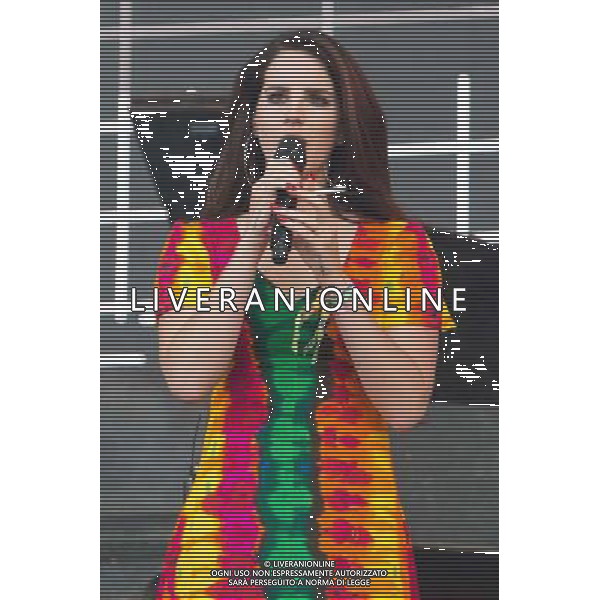 Lana del Rey, real name Elizabeth Woolridge Grant, performs on the Pyramid Stage, at Glatstonbury Festival 2014, Worthy Farm, Pilton, Somerset UK on 28th June 2014. Shown here Lana smokes a cigarette on stage AG ALDO LIVERANI SAS ONLY ITALY