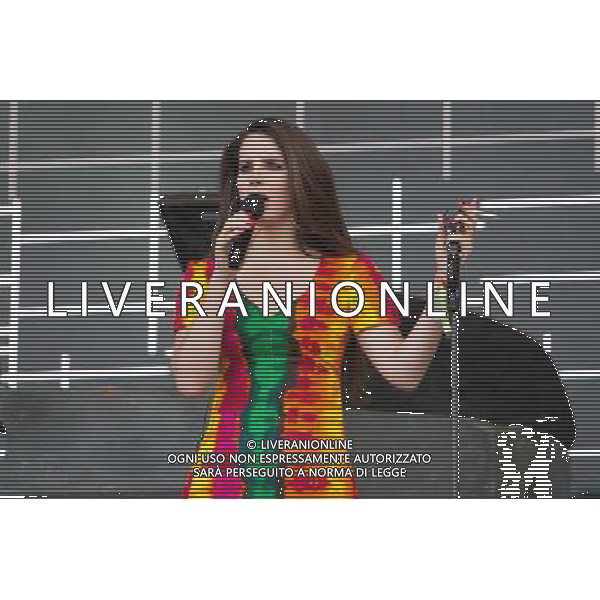 Lana del Rey, real name Elizabeth Woolridge Grant, performs on the Pyramid Stage, at Glatstonbury Festival 2014, Worthy Farm, Pilton, Somerset UK on 28th June 2014. Shown here Lana smokes a cigarette on stage AG ALDO LIVERANI SAS ONLY ITALY