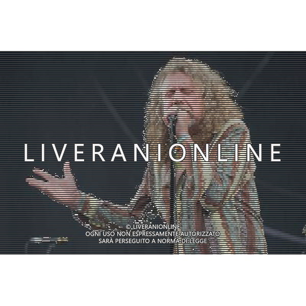 English singer-songwriterand Led Zeppelin vocalist Robert Plant (CBE) performs on The Pyramid Stage at Glastonbury Festival 2014, Worthy Farm, Pilton, Somerset, UK on Saturday 28th June 2014. AG ALDO LIVERANI SAS ONLY ITALY