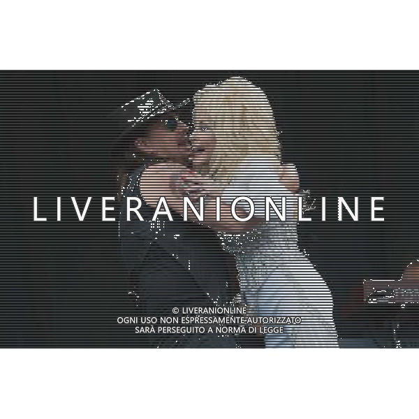Bon Jovi guitarist Richie Sambora duets with American singer-songwriter Dolly Parton on The Pyramid Stage at Glastonbury Festival 2014, Worthy Farm, Pilton, Somerset, UK on Sunday 29th June 2014. AG ALDO LIVERANI SAS ONLY ITALY