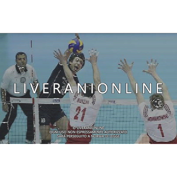(140630) -- TEHRAN, June 30, 2014 () -- Amir Ghafour (2nd L) of Iran spikes the ball during the match against Poland at FIVB Men\'s Volleyball World League 2014 at Azadi Stadium in Tehran, Iran on June 29, 2014. Iran won 3-0. (/Ahmad Halabisaz) ©PHOTOSHOT/Agenzia Aldo Liverani sas - ITALY ONLY - EDITORIAL USE ONLY