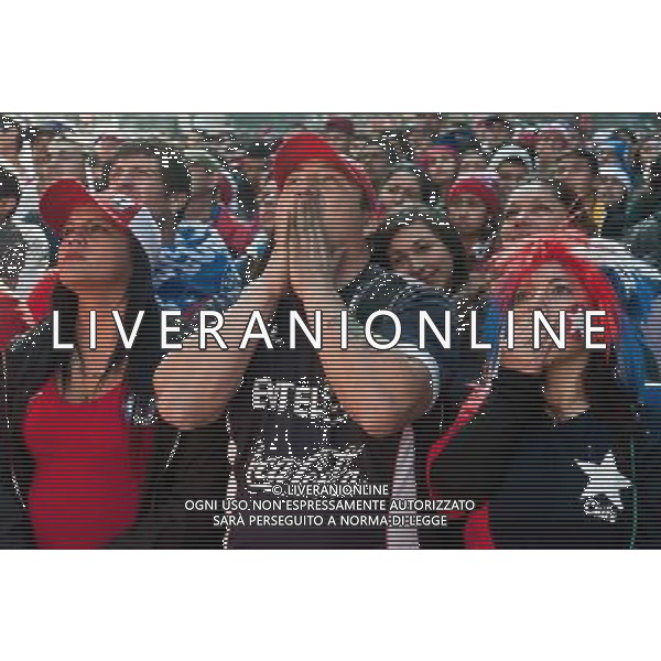 (140628) -- BRASILIA, June 28, 2014 () -- Chile\'s fans react while watching a Round of 16 match between Brazil and Chile of 2014 FIFA World Cup on a screen installed in Santiago, Chile, on June 28, 2014. Brazil won 4-3 (3-2 in penalties) over Chile and qualified for Quarter-finals on Saturday. (/Jorge Villegas)(rh) ©PHOTOSHOT/Agenzia Aldo Liverani sas - ITALY ONLY - EDITORIAL USE ONLY - Brasile Vs Cile Coppa del Mondo di calcio Fifa 2014 28 giugno 2014. Brasile ha vinto 4-3 (3-2 ai calci di rigore) e si qualifica per Quarti di finale