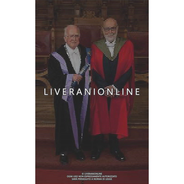 (140629) -- EDINBURGH, June 29, 2014 () -- Nobel Prize laureates Peter Higgs (L) and Francois Englert pose for photos in Edinburgh, Britain, on June 28, 2014. Nobel Prize laureates Peter Higgs and Francois Englert on Saturday received honorary degrees at an event in Edinburgh. At a graduation ceremony in the University of Edinburgh\'s McEwan Hall, Professor Higgs of the University of Edinburgh and Professor Englert of the Free University of Brussels received doctorates in science from one another\'s institutions. (/University of Edinburgh)(bxq) ©PHOTOSHOT/Agenzia Aldo Liverani sas - ITALY ONLY - EDITORIAL USE ONLY - Il Premio Nobel Peter Higgs e François Englert hanno ricevuto la laurea honoris causa ad un evento a Edimburgo, Gran Bretagna, 28 giugno 2014