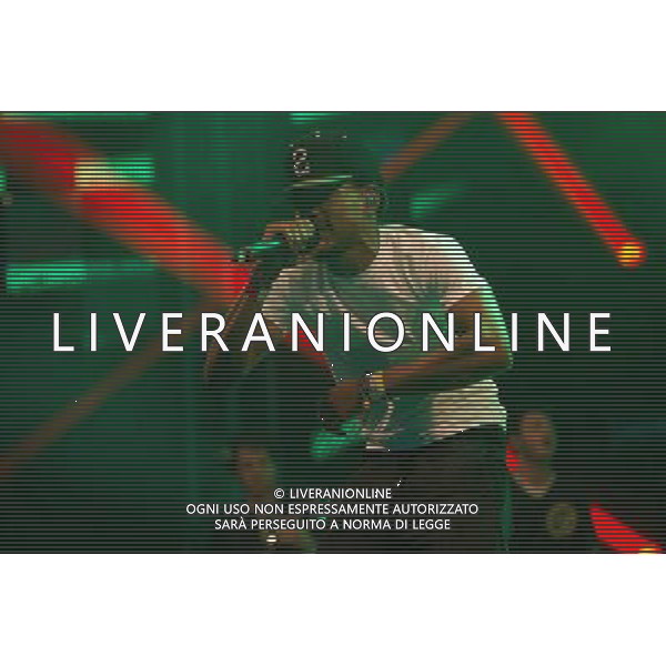 American hip hop rapper Chance The Rapper (born Chancelor Bennett) performs on The John Peel Stage at Glastonbury Festival 2014, Worthy Farm, Pilton, Somerset, UK on Sunday 29th June 2014. ©photoshot/Agenzia Aldo Liverani sas - ITALY ONLY - EDITORIAL USE ONLY