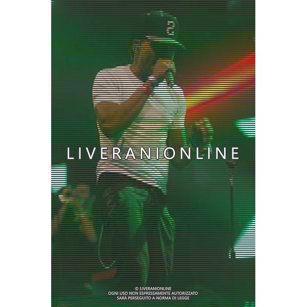 American hip hop rapper Chance The Rapper (born Chancelor Bennett) performs on The John Peel Stage at Glastonbury Festival 2014, Worthy Farm, Pilton, Somerset, UK on Sunday 29th June 2014. ©photoshot/Agenzia Aldo Liverani sas - ITALY ONLY - EDITORIAL USE ONLY