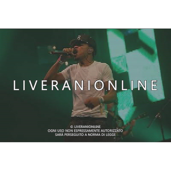 American hip hop rapper Chance The Rapper (born Chancelor Bennett) performs on The John Peel Stage at Glastonbury Festival 2014, Worthy Farm, Pilton, Somerset, UK on Sunday 29th June 2014. ©photoshot/Agenzia Aldo Liverani sas - ITALY ONLY - EDITORIAL USE ONLY