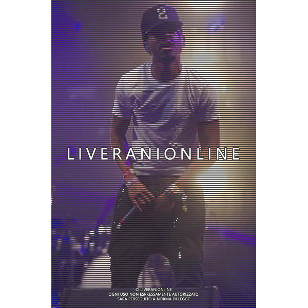 American hip hop rapper Chance The Rapper (born Chancelor Bennett) performs on The John Peel Stage at Glastonbury Festival 2014, Worthy Farm, Pilton, Somerset, UK on Sunday 29th June 2014. ©photoshot/Agenzia Aldo Liverani sas - ITALY ONLY - EDITORIAL USE ONLY