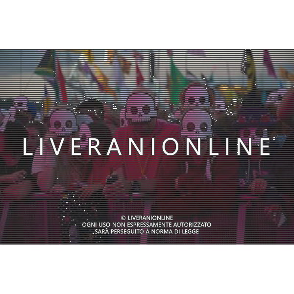 Kasabian fans wearing skull masks during their set on The Pyramid Stage at Glastonbury Festival 2014, Worthy Farm, Pilton, Somerset, UK on Sunday 29th June 2014. ©photoshot/Agenzia Aldo Liverani sas - ITALY ONLY - EDITORIAL USE ONLY