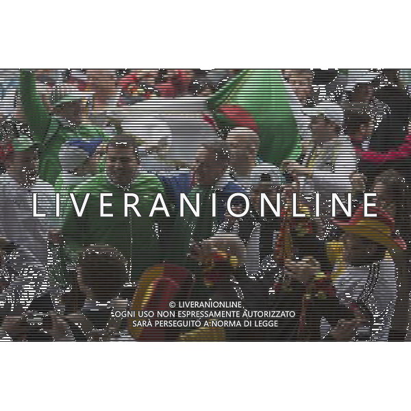 (140630) --PORTO ALEGRE, June 30, 2014 () -- Supporters of Germany and Algeria cheer while waiting to watch a Round of 16 match between Germany and Algeria of 2014 FIFA World Cup, in downtown Porto Alegre, Brazil, on June 30, 2014. (/Guillermo Arias)(pcy) ©photoshot/Agenzia Aldo Liverani sas - ITALY ONLY - EDITORIAL USE ONLY - Germania Vs Algeria Coppa del Mondo FIFA World Cup presso l\'Estadio Stadio Beira-Rio di Porto Alegre, in Brasile, il 30 giugno 2014