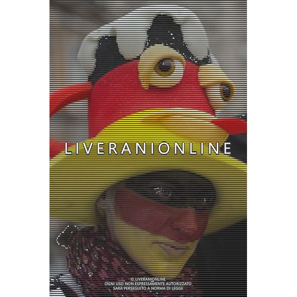 (140630) --PORTO ALEGRE, June 30, 2014 () -- A supporter of Germany look on while waiting to watch a Round of 16 match between Germany and Algeria of 2014 FIFA World Cup, in downtown Porto Alegre, Brazil, on June 30, 2014. (/Guillermo Arias)(pcy) ©photoshot/Agenzia Aldo Liverani sas - ITALY ONLY - EDITORIAL USE ONLY - Germania Vs Algeria Coppa del Mondo FIFA World Cup presso l\'Estadio Stadio Beira-Rio di Porto Alegre, in Brasile, il 30 giugno 2014