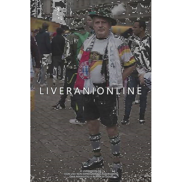 (140630) --PORTO ALEGRE, June 30, 2014 () -- A supporter of Germany poses while waiting to watch a Round of 16 match between Germany and Algeria of 2014 FIFA World Cup, in downtown Porto Alegre, Brazil, on June 30, 2014. (/Guillermo Arias)(pcy) ©photoshot/Agenzia Aldo Liverani sas - ITALY ONLY - EDITORIAL USE ONLY - Germania Vs Algeria Coppa del Mondo FIFA World Cup presso l\'Estadio Stadio Beira-Rio di Porto Alegre, in Brasile, il 30 giugno 2014