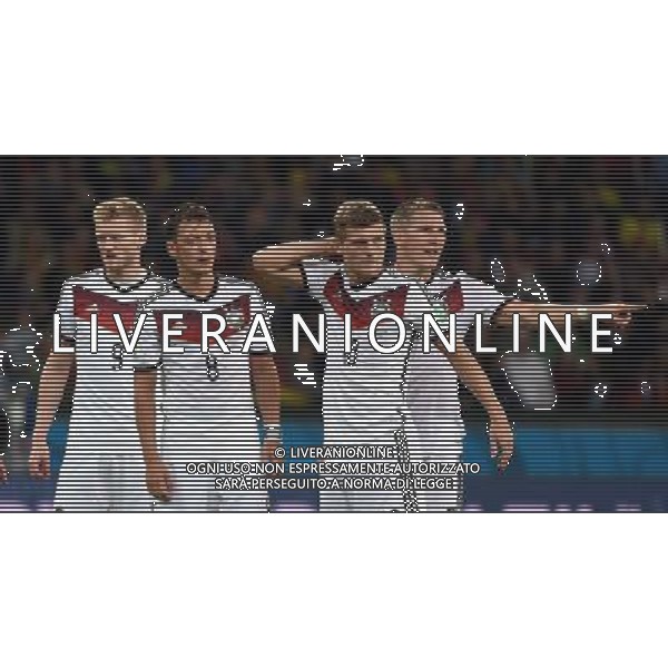 (140630) -- PORTO ALEGRE, June 30, 2014 () -- Germany\'s Andre Schurrle, Mesut Ozil, Toni Kroos and Bastian Schweinsteiger (from L to R) react during a Round of 16 match between Germany and Algeria of 2014 FIFA World Cup at the Estadio Beira-Rio Stadium in Porto Alegre, Brazil, on June 30, 2014. (/Li Ga)(pcy) ©photoshot/Agenzia Aldo Liverani sas - ITALY ONLY - EDITORIAL USE ONLY - Germania Vs Algeria Coppa del Mondo FIFA World Cup presso l\'Estadio Stadio Beira-Rio di Porto Alegre, in Brasile, il 30 giugno 2014