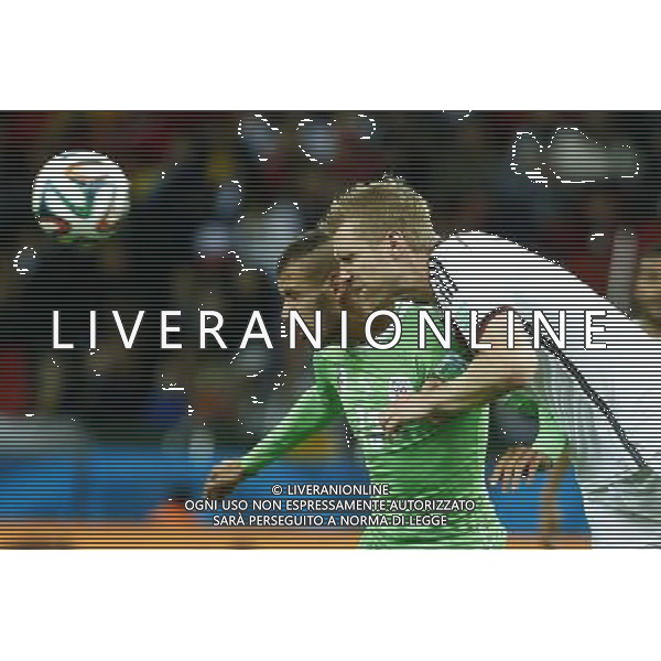 (140630) -- PORTO ALEGRE, June 30, 2014 () -- Germany\'s Per Mertesacker vies with Algeria\'s Islam Slimani during a Round of 16 match between Germany and Algeria of 2014 FIFA World Cup at the Estadio Beira-Rio Stadium in Porto Alegre, Brazil, on June 30, 2014. (/Chen Jianli)(rh) ©photoshot/Agenzia Aldo Liverani sas - ITALY ONLY - EDITORIAL USE ONLY - Germania Vs Algeria Coppa del Mondo FIFA World Cup presso l\'Estadio Stadio Beira-Rio di Porto Alegre, in Brasile, il 30 giugno 2014