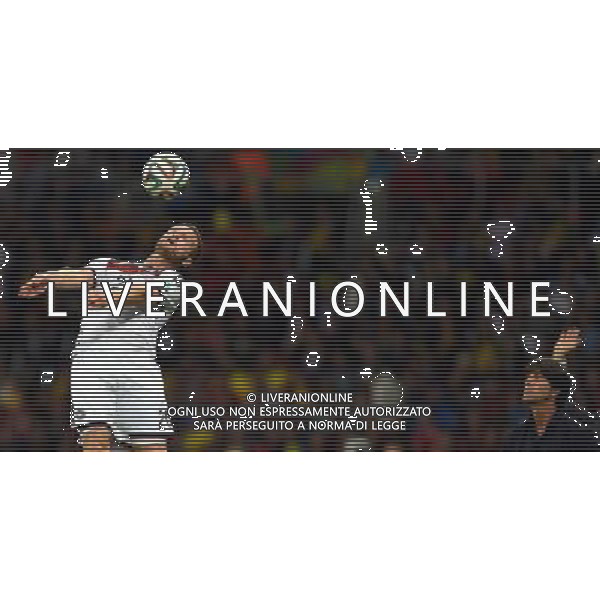 (140630) -- PORTO ALEGRE, June 30, 2014 () -- Germany\'s Shkodran Mustafi (L) heads the ball during a Round of 16 match between Germany and Algeria of 2014 FIFA World Cup at the Estadio Beira-Rio Stadium in Porto Alegre, Brazil, on June 30, 2014. (/Li Ga)(pcy) ©photoshot/Agenzia Aldo Liverani sas - ITALY ONLY - EDITORIAL USE ONLY - Germania Vs Algeria Coppa del Mondo FIFA World Cup presso l\'Estadio Stadio Beira-Rio di Porto Alegre, in Brasile, il 30 giugno 2014