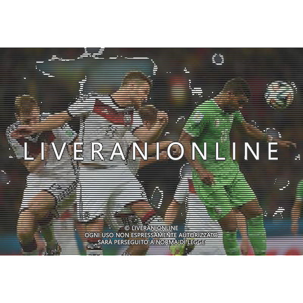 (140630) -- PORTO ALEGRE, June 30, 2014 () -- Algeria\'s Hilal Soudani (R, front) competes for a header with Germany\'s Shkodran Mustafi (L, front) during a Round of 16 match between Germany and Algeria of 2014 FIFA World Cup at the Estadio Beira-Rio Stadium in Porto Alegre, Brazil, on June 30, 2014. (/Li Ga)(pcy) ©photoshot/Agenzia Aldo Liverani sas - ITALY ONLY - EDITORIAL USE ONLY - Germania Vs Algeria Coppa del Mondo FIFA World Cup presso l\'Estadio Stadio Beira-Rio di Porto Alegre, in Brasile, il 30 giugno 2014