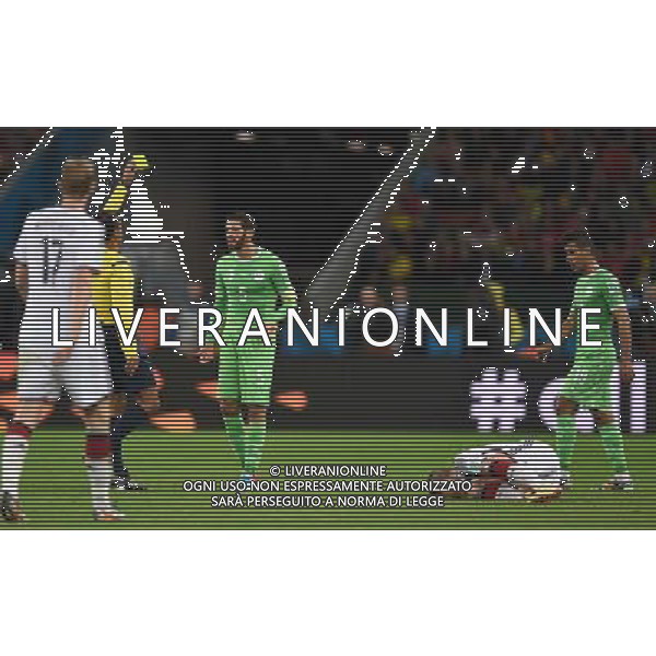 (140630) -- PORTO ALEGRE, June 30, 2014 () -- Brazil\'s referee Sandro Ricci (2nd L) shows a yellow card to Algeria\'s Rafik Halliche (3rd L) during a Round of 16 match between Germany and Algeria of 2014 FIFA World Cup at the Estadio Beira-Rio Stadium in Porto Alegre, Brazil, on June 30, 2014. (/Li Ga)(pcy) ©photoshot/Agenzia Aldo Liverani sas - ITALY ONLY - EDITORIAL USE ONLY - Germania Vs Algeria Coppa del Mondo FIFA World Cup presso l\'Estadio Stadio Beira-Rio di Porto Alegre, in Brasile, il 30 giugno 2014