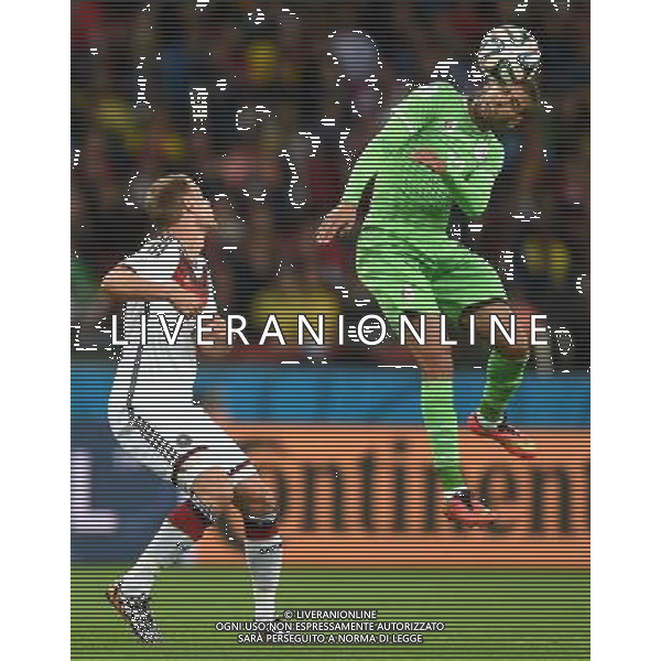 (140630) -- PORTO ALEGRE, June 30, 2014 () -- Algeria\'s Islam Slimani (R) heads the ball during a Round of 16 match between Germany and Algeria of 2014 FIFA World Cup at the Estadio Beira-Rio Stadium in Porto Alegre, Brazil, on June 30, 2014. (/Li Ga)(pcy) ©photoshot/Agenzia Aldo Liverani sas - ITALY ONLY - EDITORIAL USE ONLY - Germania Vs Algeria Coppa del Mondo FIFA World Cup presso l\'Estadio Stadio Beira-Rio di Porto Alegre, in Brasile, il 30 giugno 2014