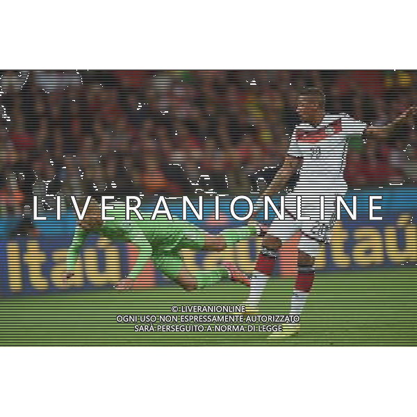 (140630) -- PORTO ALEGRE, June 30, 2014 () -- Germany\'s Jerome Boateng (R) vies with Algeria\'s Islam Slimani during a Round of 16 match between Germany and Algeria of 2014 FIFA World Cup at the Estadio Beira-Rio Stadium in Porto Alegre, Brazil, on June 30, 2014. (/Li Ga)(pcy) ©photoshot/Agenzia Aldo Liverani sas - ITALY ONLY - EDITORIAL USE ONLY - Germania Vs Algeria Coppa del Mondo FIFA World Cup presso l\'Estadio Stadio Beira-Rio di Porto Alegre, in Brasile, il 30 giugno 2014