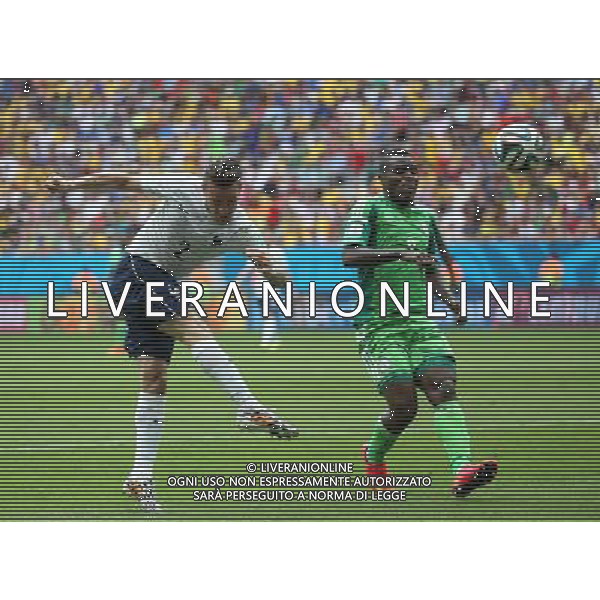 (140630) -- BRASILIA, June 30, 2014 () -- France\'s Mathieu Debuchy (L) shoots the ball during a Round of 16 match between France and Nigeria of 2014 FIFA World Cup at the Estadio Nacional Stadium in Brasilia, Brazil, on June 30, 2014. (/Li Ming)(rh) ©photoshot/Agenzia Aldo Liverani sas - ITALY ONLY - EDITORIAL USE ONLY - Francia v Nigeria Coppa del Mondo FIFA 2014 Nacional stadio Estadio in Brasilia, Brasile, 30 giugno 2014