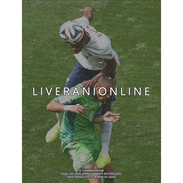 (140630) -- BRASILIA, June 30, 2014 () -- France\'s Patrice Evra vies with Nigeria\'s Peter Osaze Odemwingie during a Round of 16 match between France and Nigeria of 2014 FIFA World Cup at the Estadio Nacional Stadium in Brasilia, Brazil, on June 30, 2014. (/Liu Dawei)(rh) ©photoshot/Agenzia Aldo Liverani sas - ITALY ONLY - EDITORIAL USE ONLY - Francia v Nigeria Coppa del Mondo FIFA 2014 Nacional stadio Estadio in Brasilia, Brasile, 30 giugno 2014