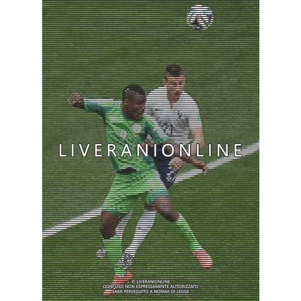 (140630) -- BRASILIA, June 30, 2014 () -- France\'s Laurent Koscielny vies with Nigeria\'s Emmanuel Emenike during a Round of 16 match between France and Nigeria of 2014 FIFA World Cup at the Estadio Nacional Stadium in Brasilia, Brazil, on June 30, 2014. (/Liu Dawei)(rh) ©photoshot/Agenzia Aldo Liverani sas - ITALY ONLY - EDITORIAL USE ONLY - Francia v Nigeria Coppa del Mondo FIFA 2014 Nacional stadio Estadio in Brasilia, Brasile, 30 giugno 2014